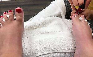 Chubby Battle-axe gets a pedicure and gives a footjob