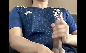 Cum shot Asian guy playing with his fat cock in japanese football suit